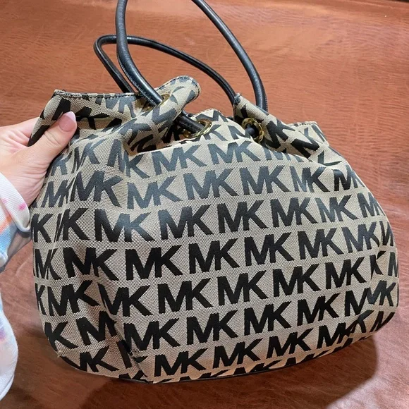 Michael Kors Monogram Black and Tan Tote - Picture 1 of 5